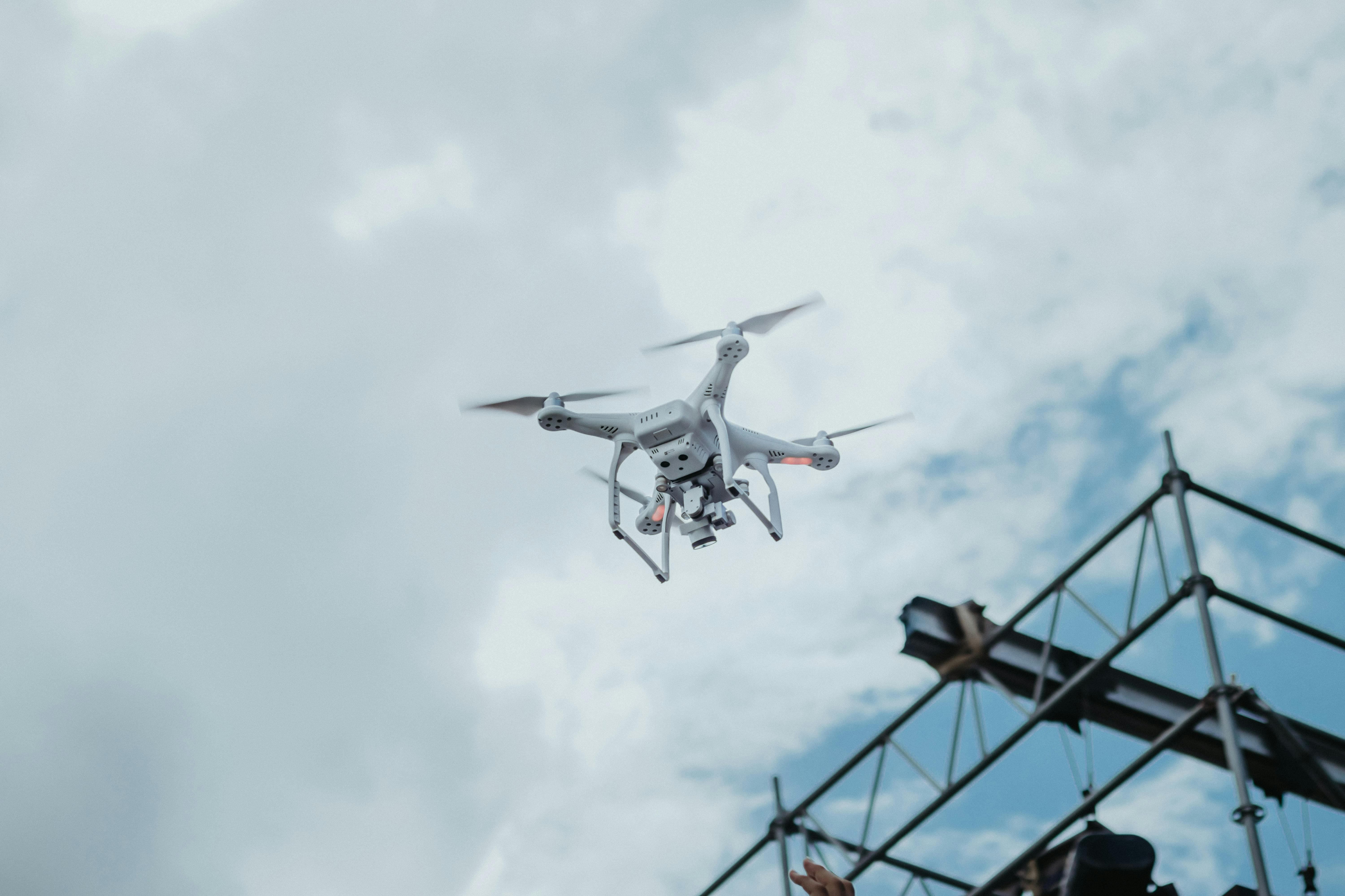 DJI drone in flight performing aerial operations